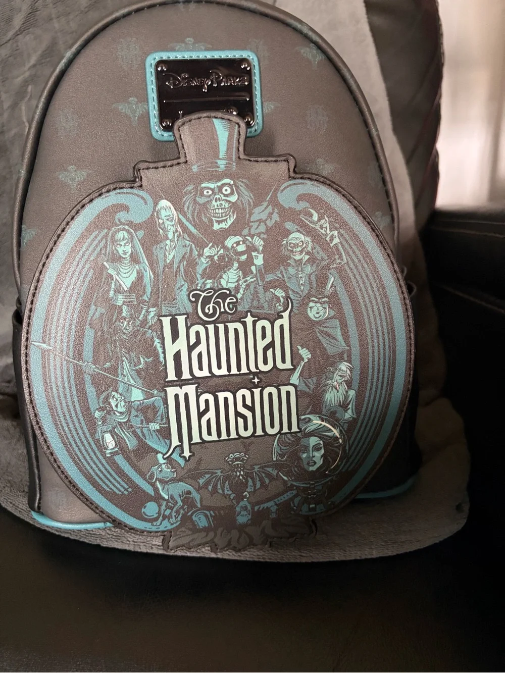 Loungefly Haunted Mansion Glow in the Dark Mini Backpack in Black and Teal
